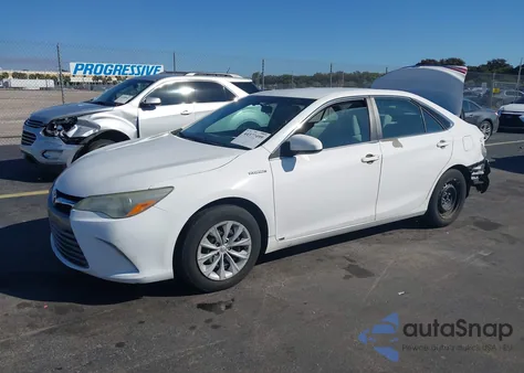 2015 Toyota Camry Hybrid Le z USA, uszkodzony, nr VIN 4T1BD1FK2FU172474